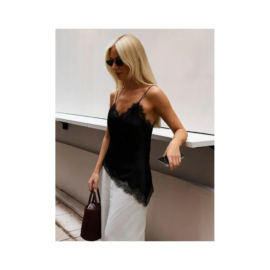 Top with lace and assymentical detail - Black